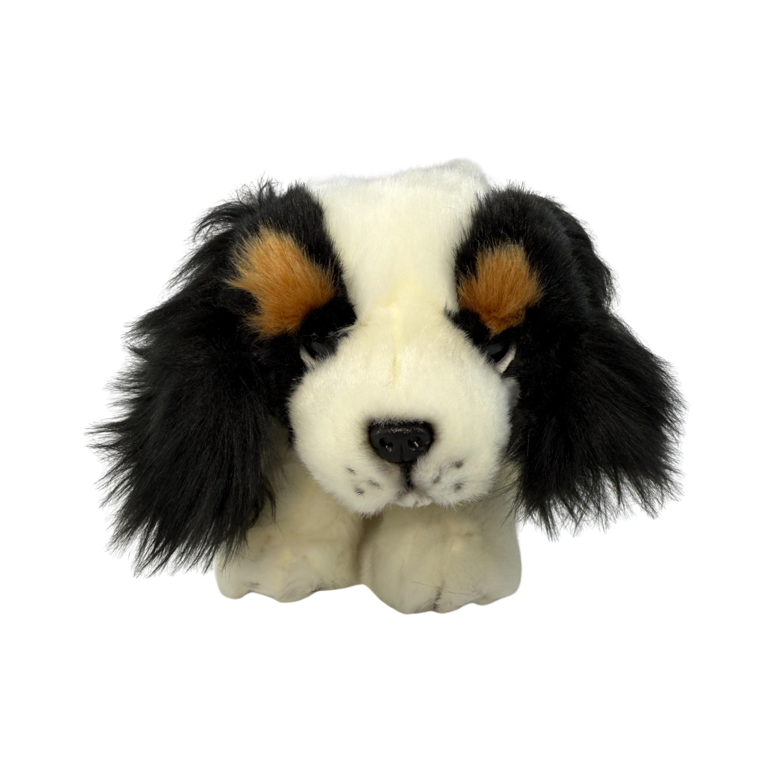 a really cute handmade realistic plush puppy in a lying position