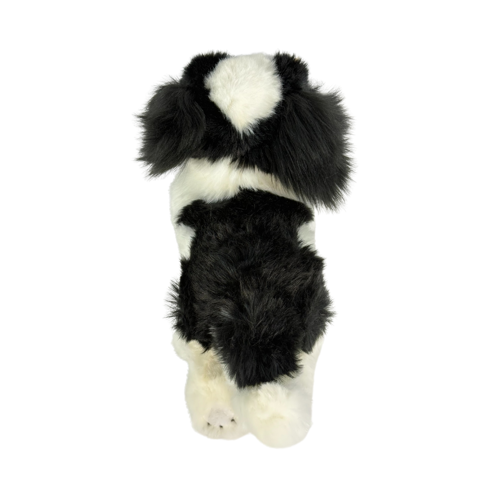 a really cute handmade realistic plush puppy in a lying position