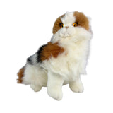 a sitting Calico cat and is a realistic soft plush toy