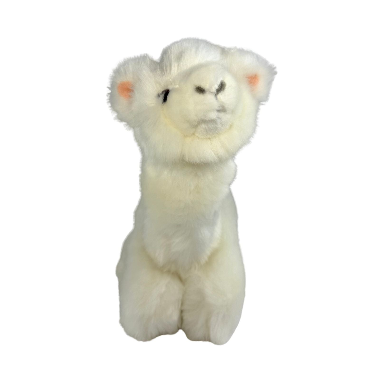 a charming white stuffed plush toy alpaca in a lying position