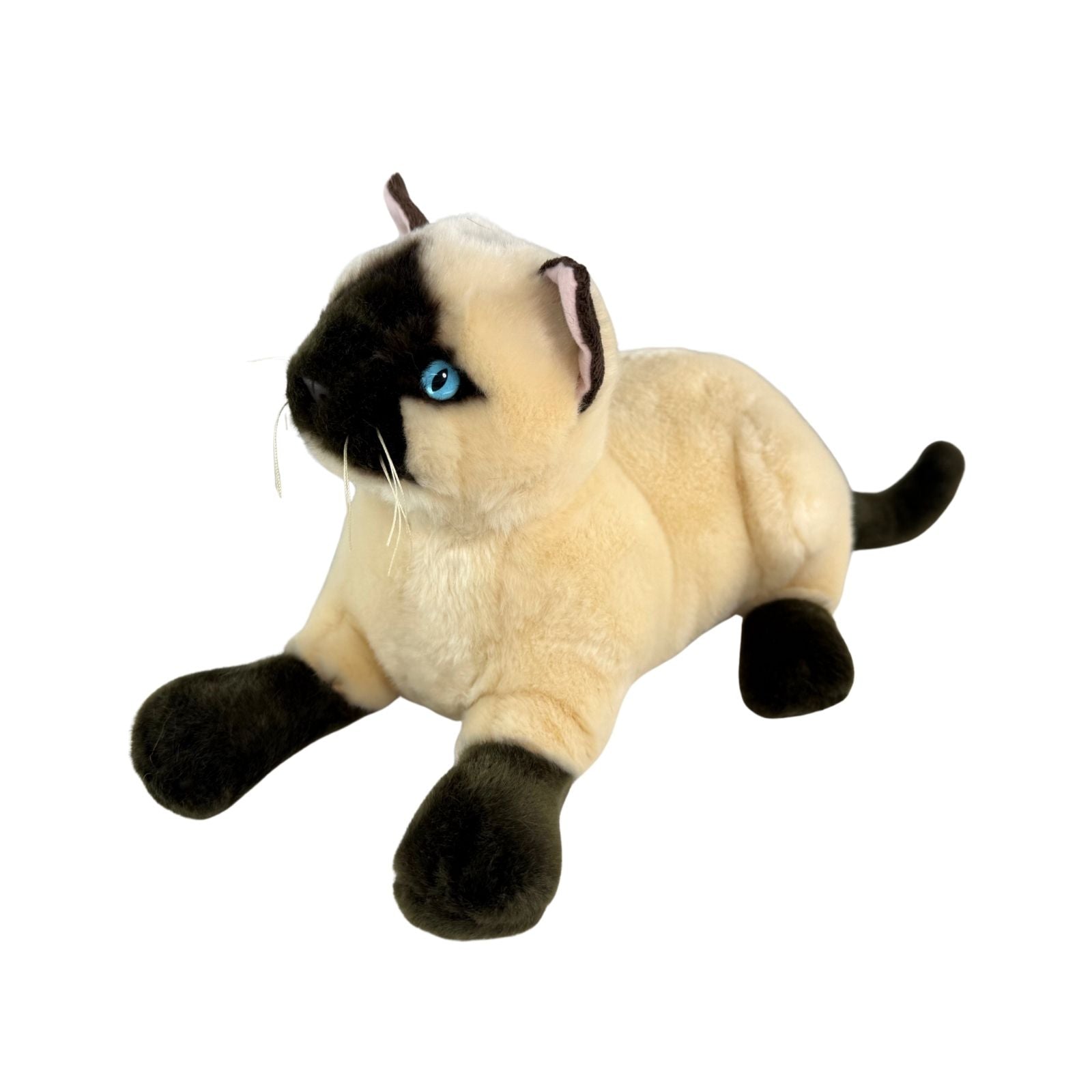 a crouching Siamese cat and is a realistic soft plush animal.
