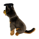 Side view of Basil Kelpie plush toy in graduation hat