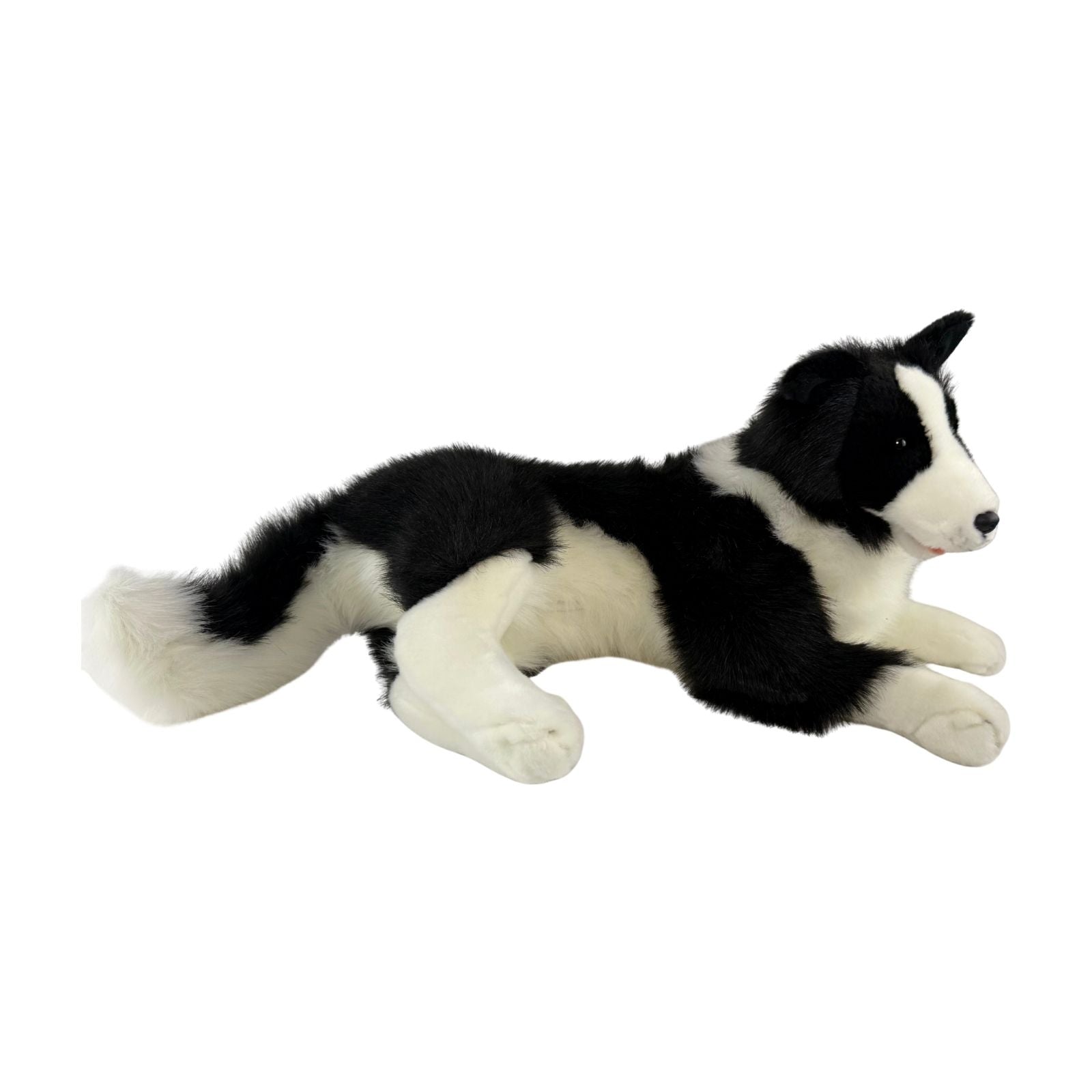 stuffed Border Collie plush toy in a lying position.