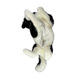 stuffed Border Collie plush toy in a lying position.