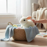 Cotton bunny plush toy sitting inside a basket