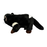 Plush toy resembling a Tasmanian Devil on a white background