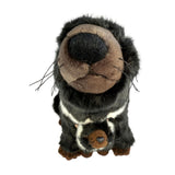 Plush toy resembling a skunk on a white background
