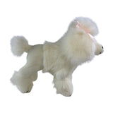 Side view of standing white poodle plush toy