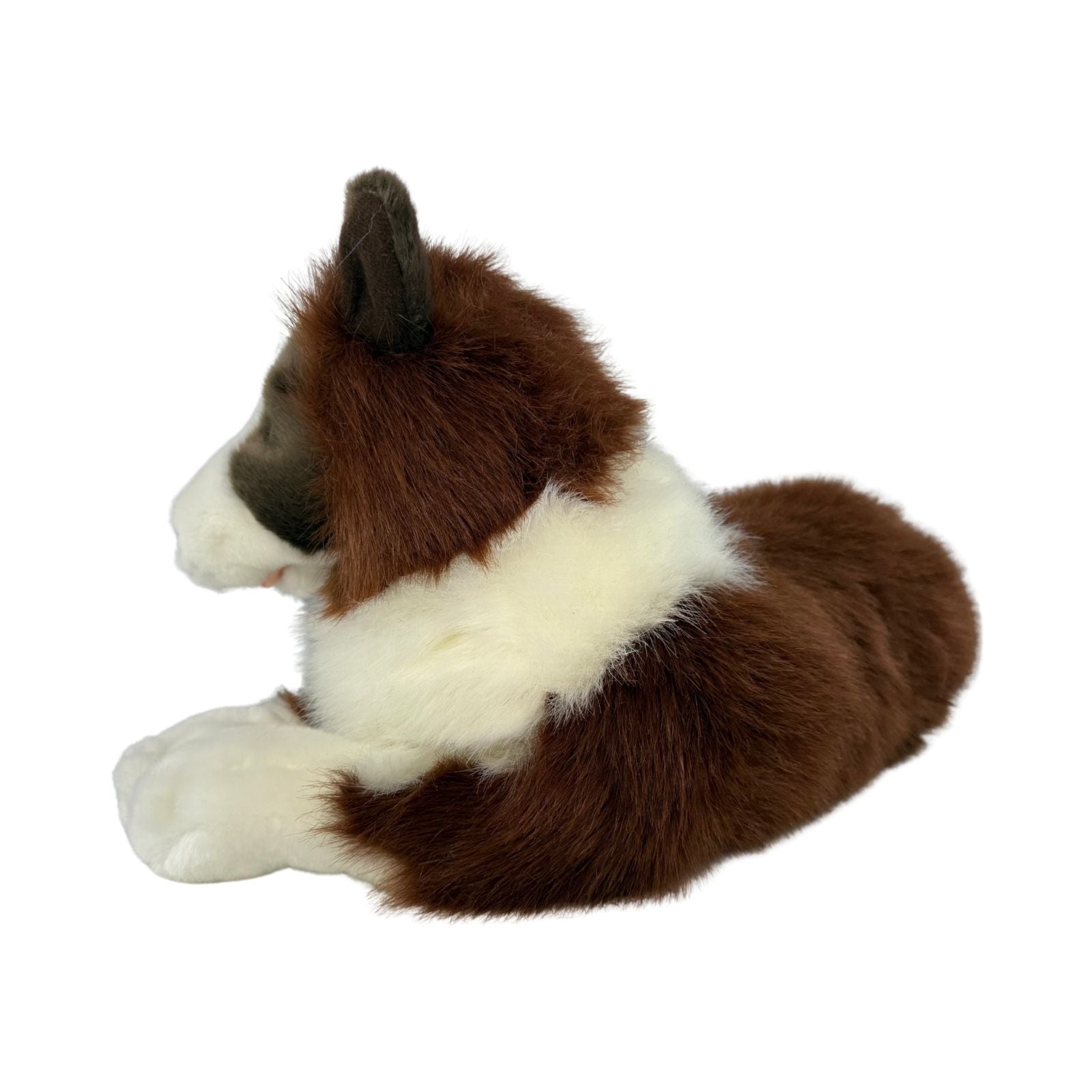 Back view of lying chocolate Border Collie plush toy