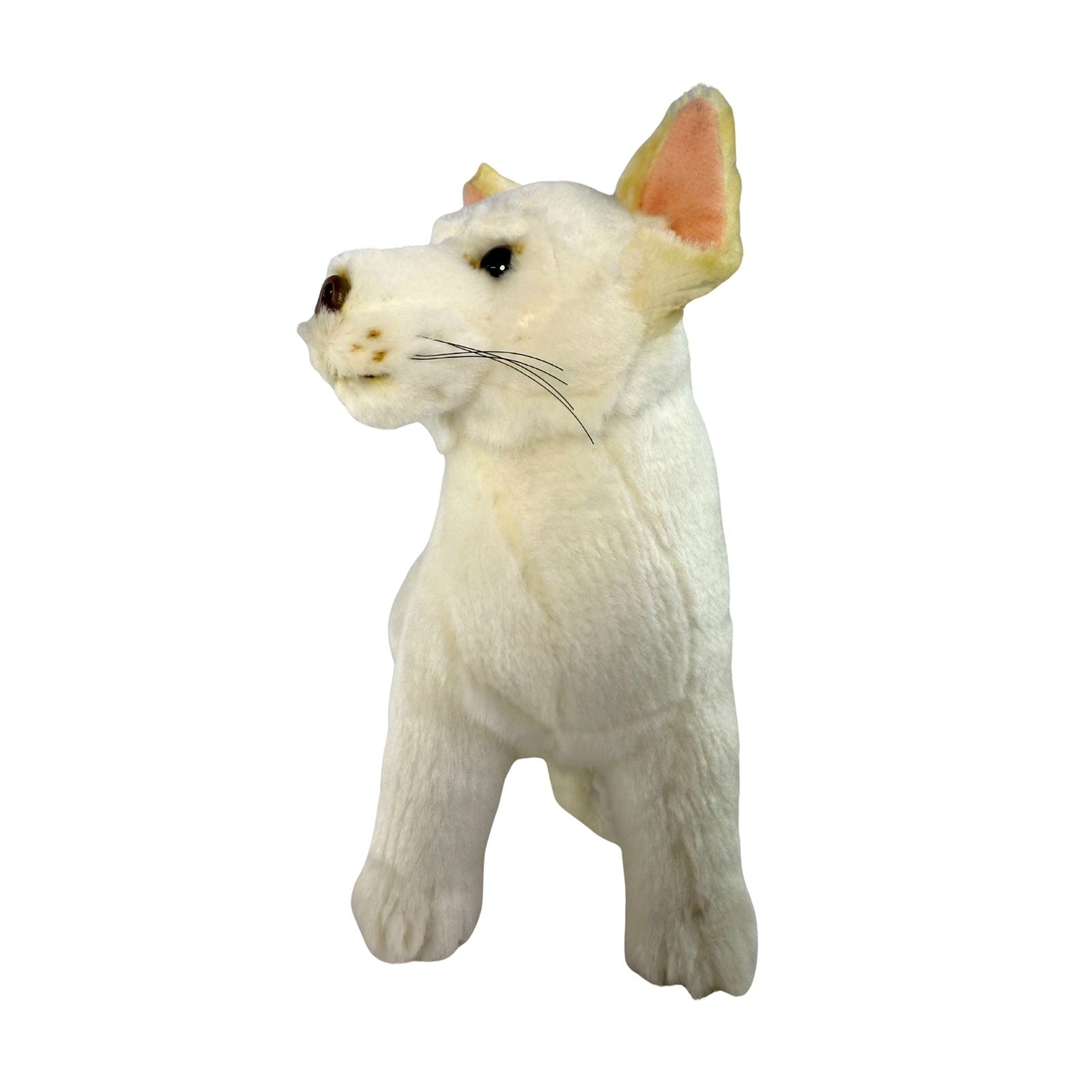 White dingo figurine on a white background