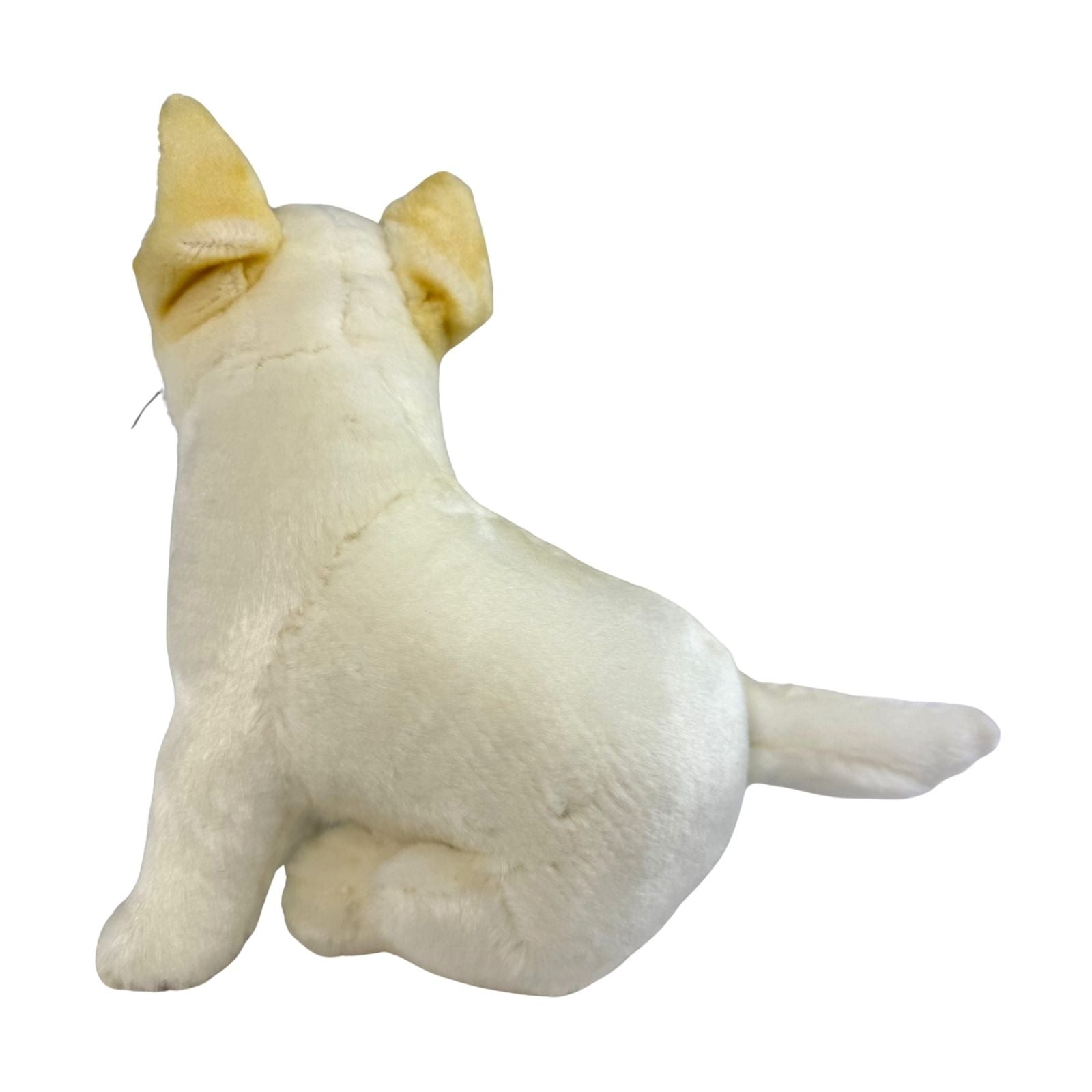 White plush dingo toy on a white background