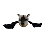 Plush toy resembling a Fruit Bat on a white background