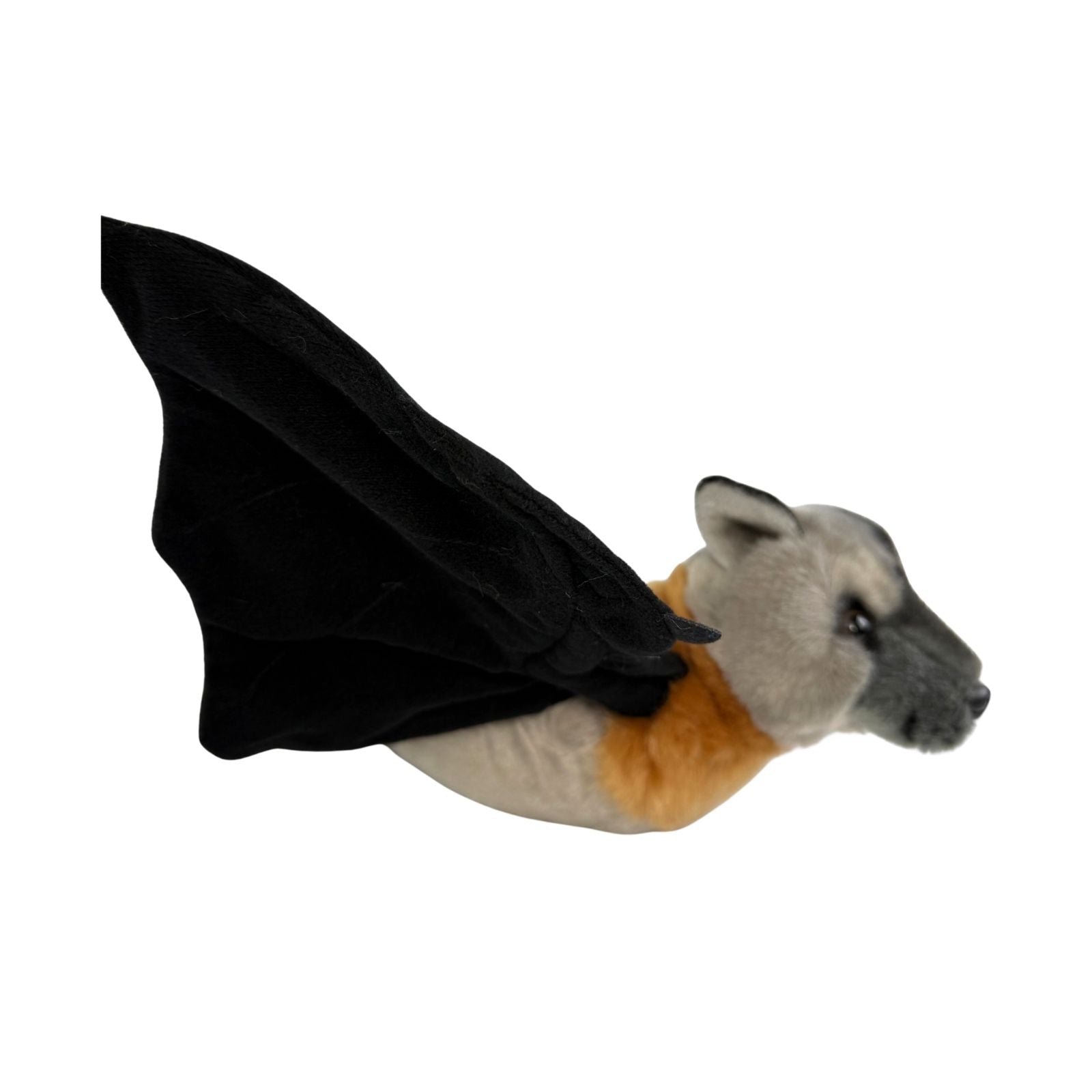Plush toy resembling a bat with black wings and gray face on a white background