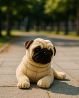 Kaos plush toy lying outdoors