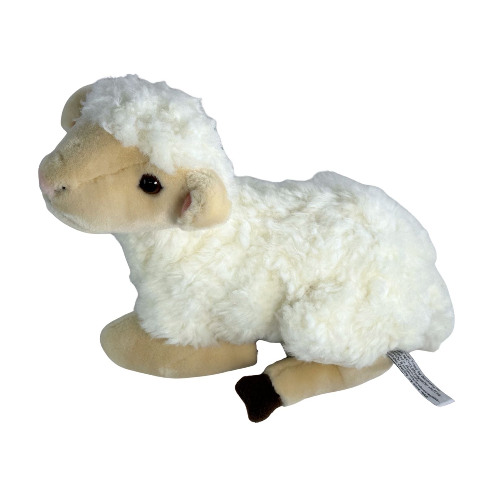 Lola sheep plush toy lying side view