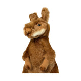 Brown plush Miles toy on a white background