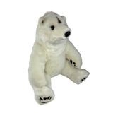 Minka polar bear plush toy sitting angle view
