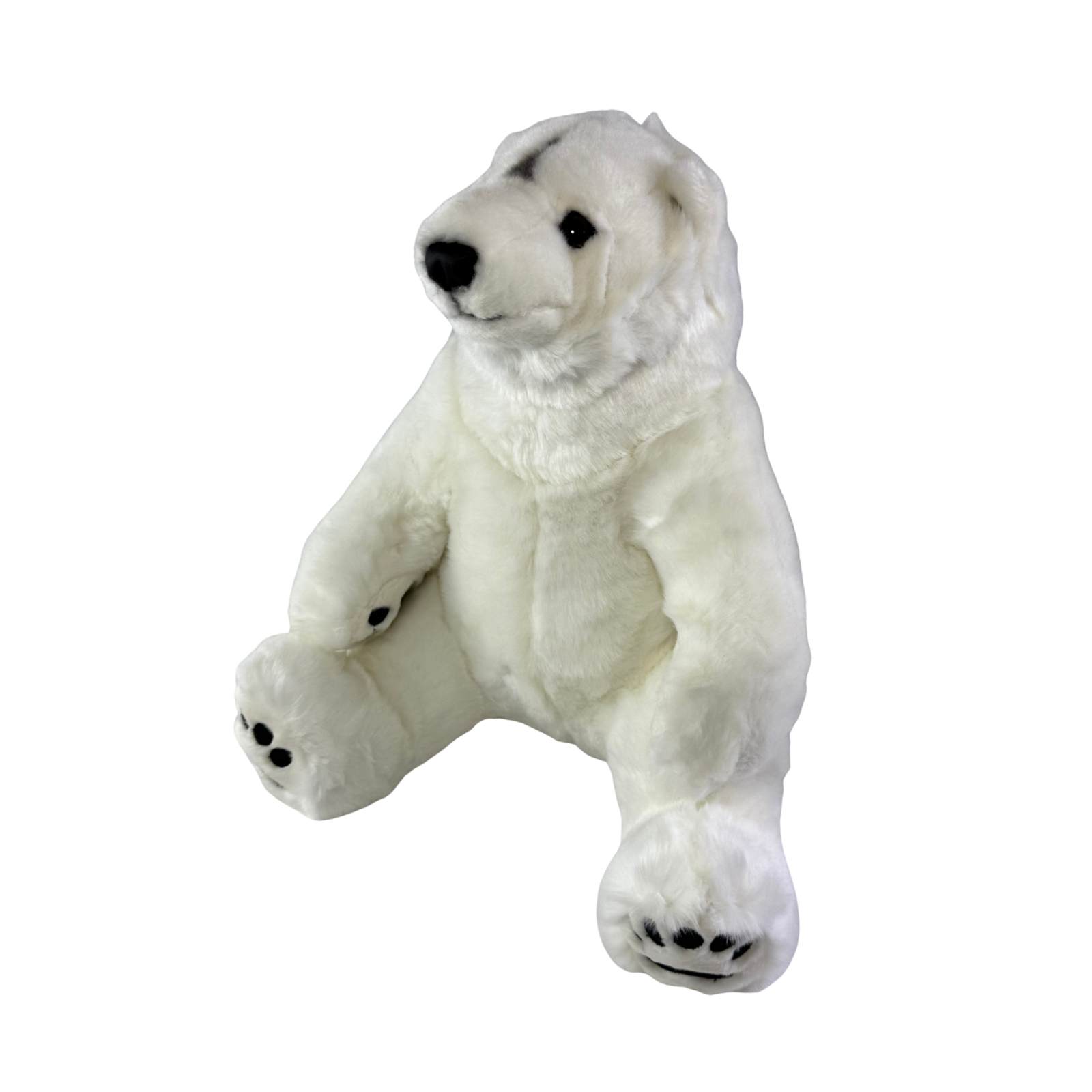 Minka polar bear plush toy sitting angle view