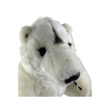 Minka polar bear plush toy close up face