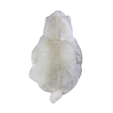 Minka polar bear plush toy sitting back view