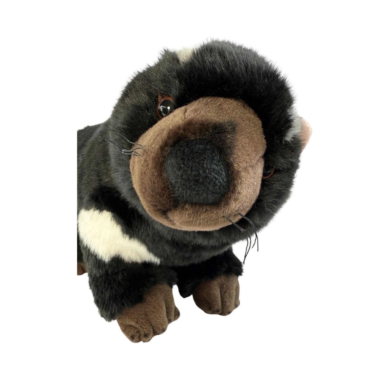 Plush toy resembling a skunk on a white background