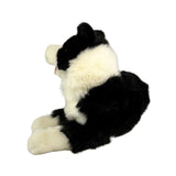 Starsky Border Collie plush toy lying