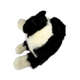 Starsky Border Collie plush toy lying