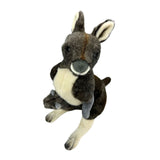 Plush donkey toy on a white background
