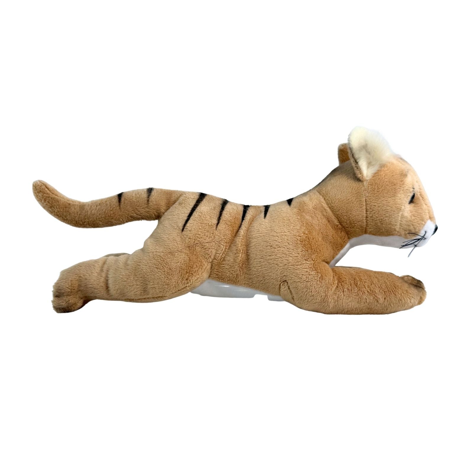 Plush toy thylacine lying down on a white background
