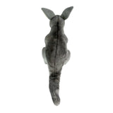 Plush toy resembling a dinosaur from behind on a white background