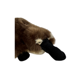 Plush toy resembling a platypus on a white background