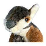 Close-up of a plush kangaroo with brown, gray, and white feathers on a white background