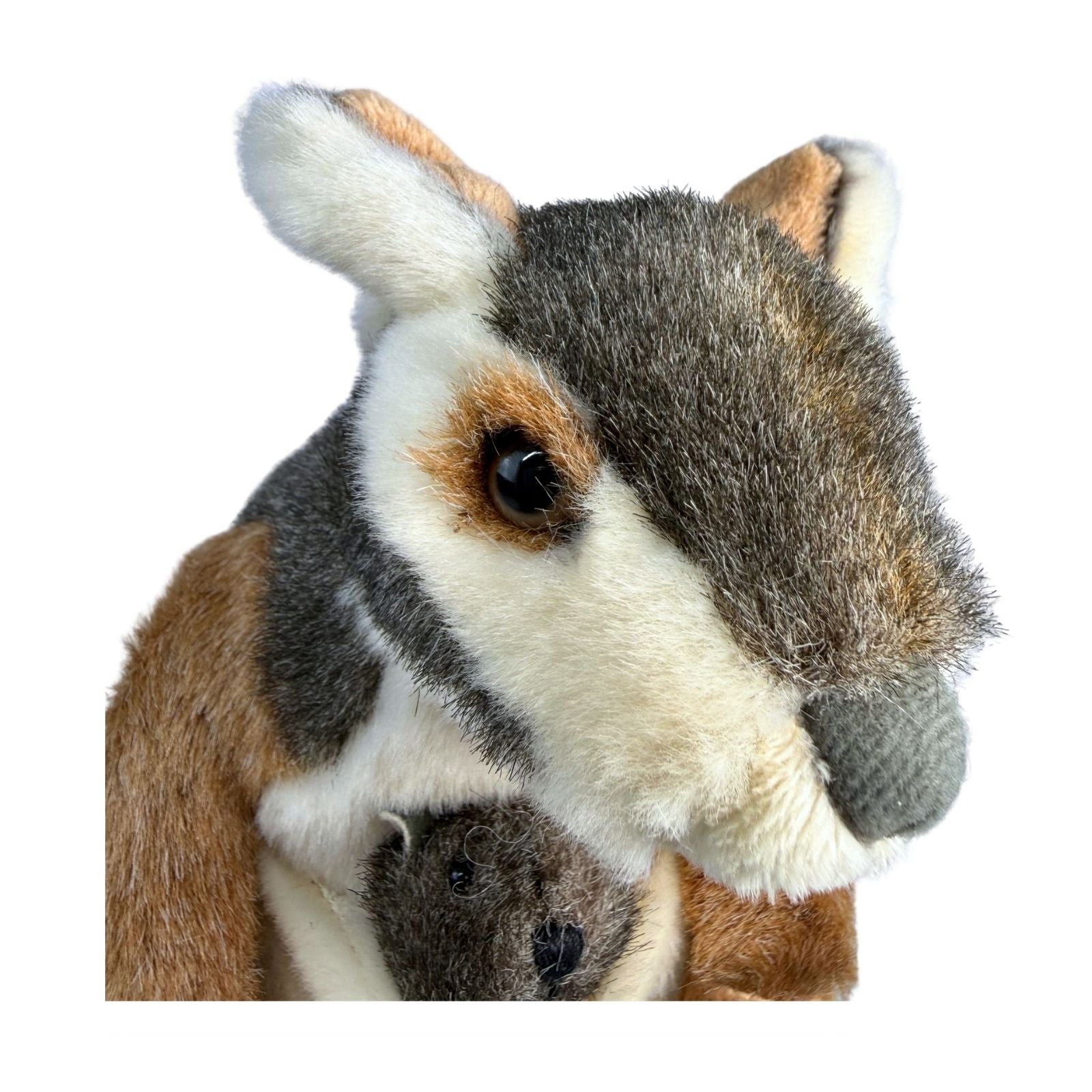 Close-up of a plush toy kangaroo a baby kangaroo with its mother on a white background