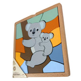 Wooden block puzzle of koala mother and baby with colorful background and packaging label