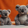 Professional header image for comparison analysis: Budget vs Premium: Stuffed Koala Plush Toy Showdown