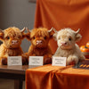 Professional header image for comparison analysis: Comparing Highland Cow Plush Toys for Perfect Fluff