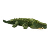 Green plush alligator toy on a white background