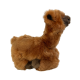 a charming brown plush toy alpaca in a lying position