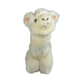 a charming white stuffed plush toy alpaca in a lying position
