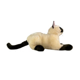 a crouching Siamese cat and is a realistic soft plush animal.