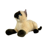 a crouching Siamese cat and is a realistic soft plush animal.