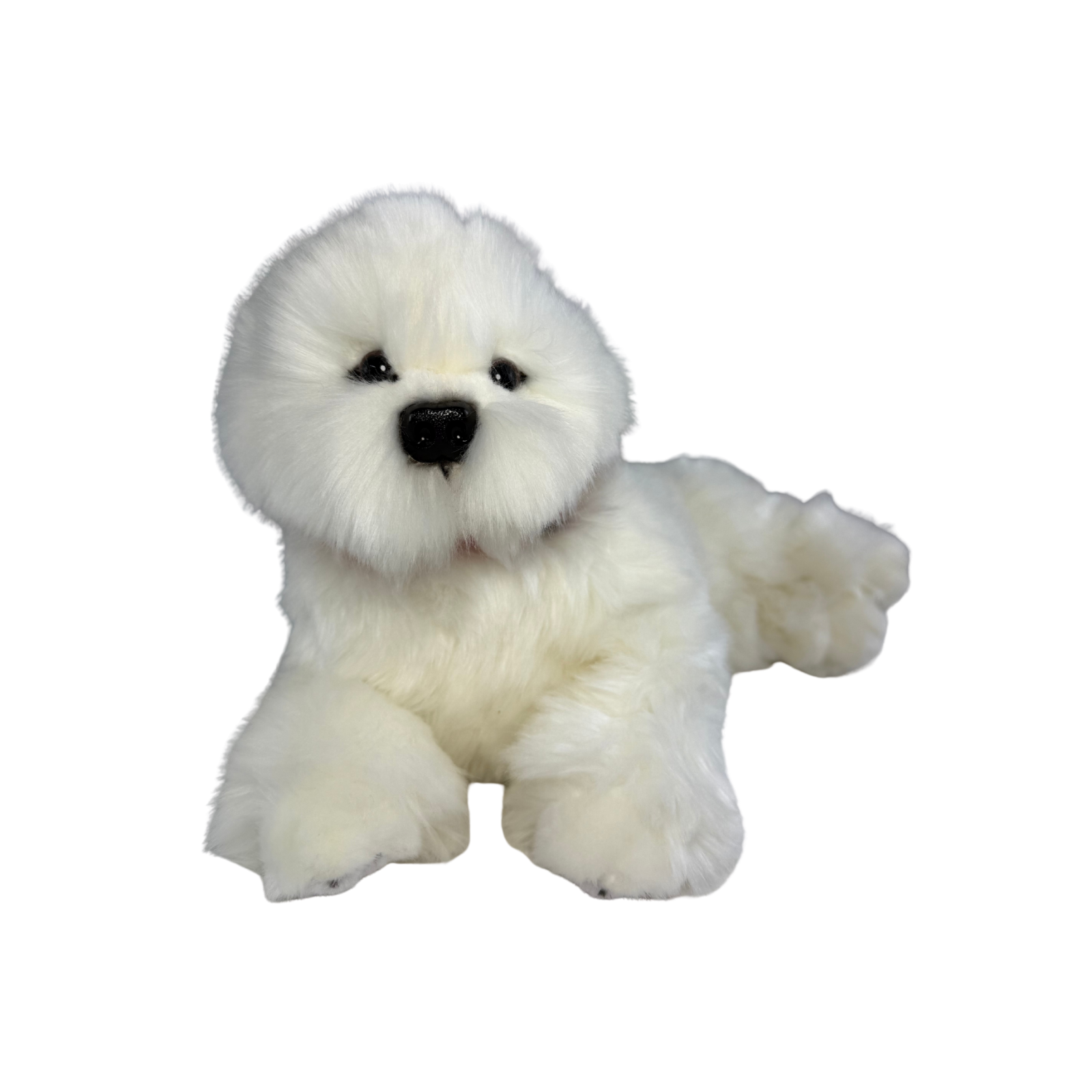 a realistic fluffy white plush dog toy in a lying position