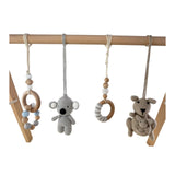 Wooden Aussie baby gym with hanging animal toys