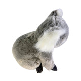 Plush toy sloth on a white background
