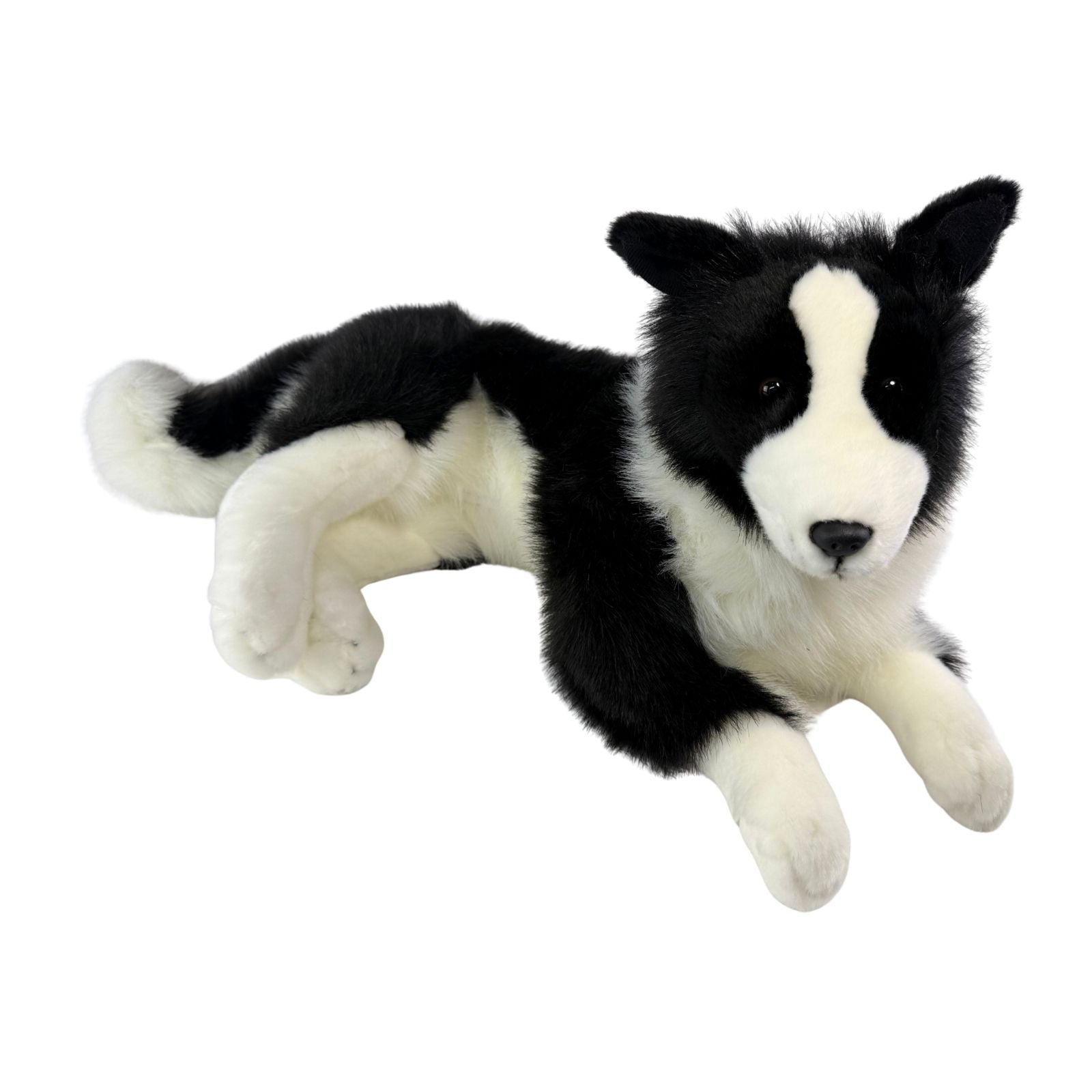 stuffed Border Collie plush toy in a lying position.