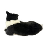 stuffed Border Collie plush toy in a lying position.