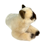 Siamese cat and is a realistic soft plush toy