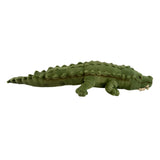 Green plush alligator toy on a white background