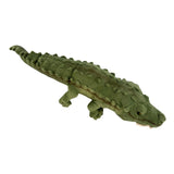 Green plush alligator toy on a white background