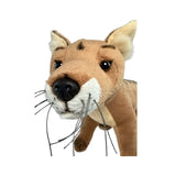 Plush toy resembling a Tasmanian Tiger on a white background